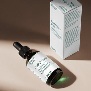 Effective Nature Methylenblau 100ml Tropfflasche braun mit Pipette und weißer Umverpackung auf beigem Untergrund